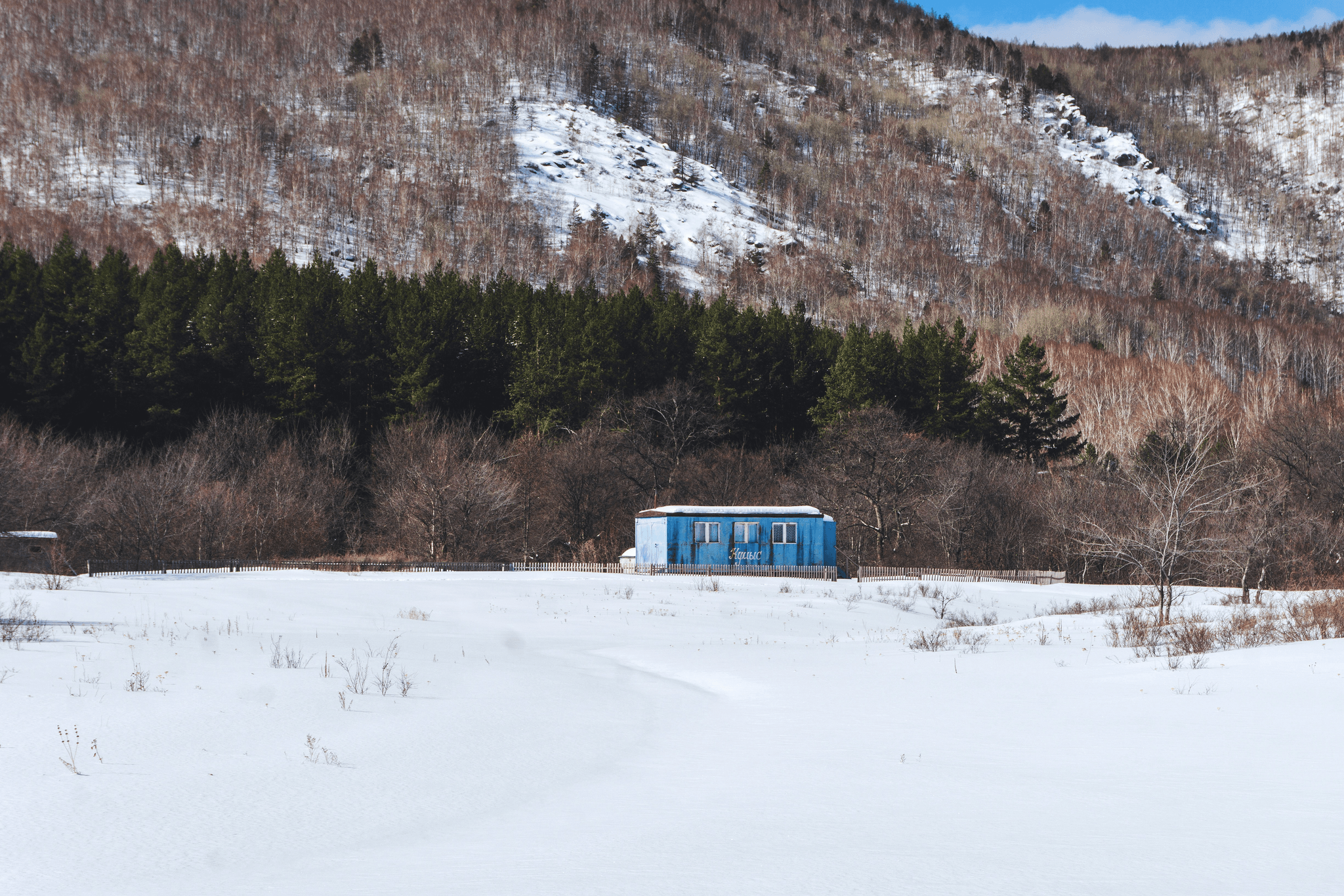 Prefab Shipping Container Cabin in Snowy Landscape