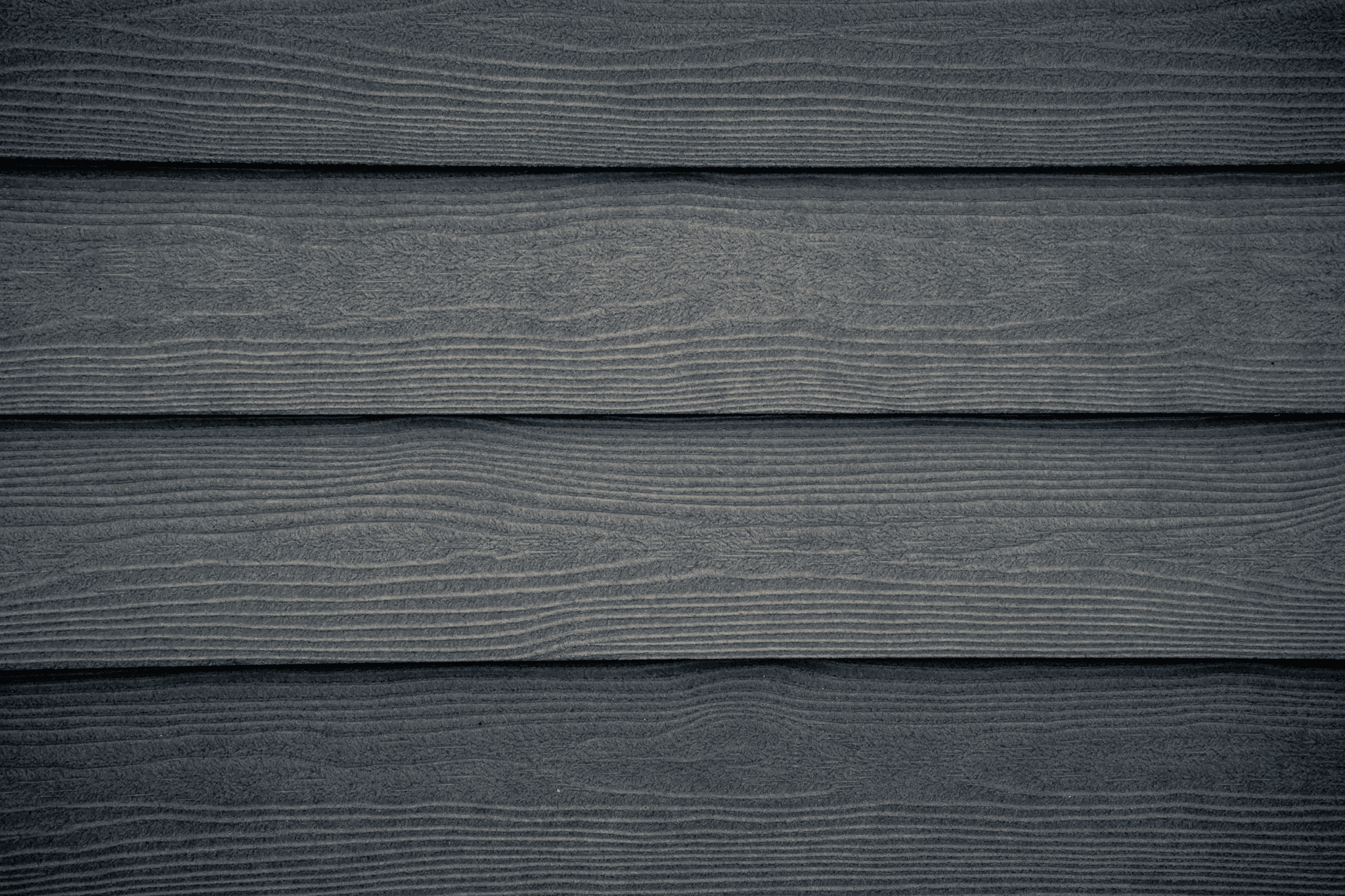 Different types of exterior cladding material including WPC