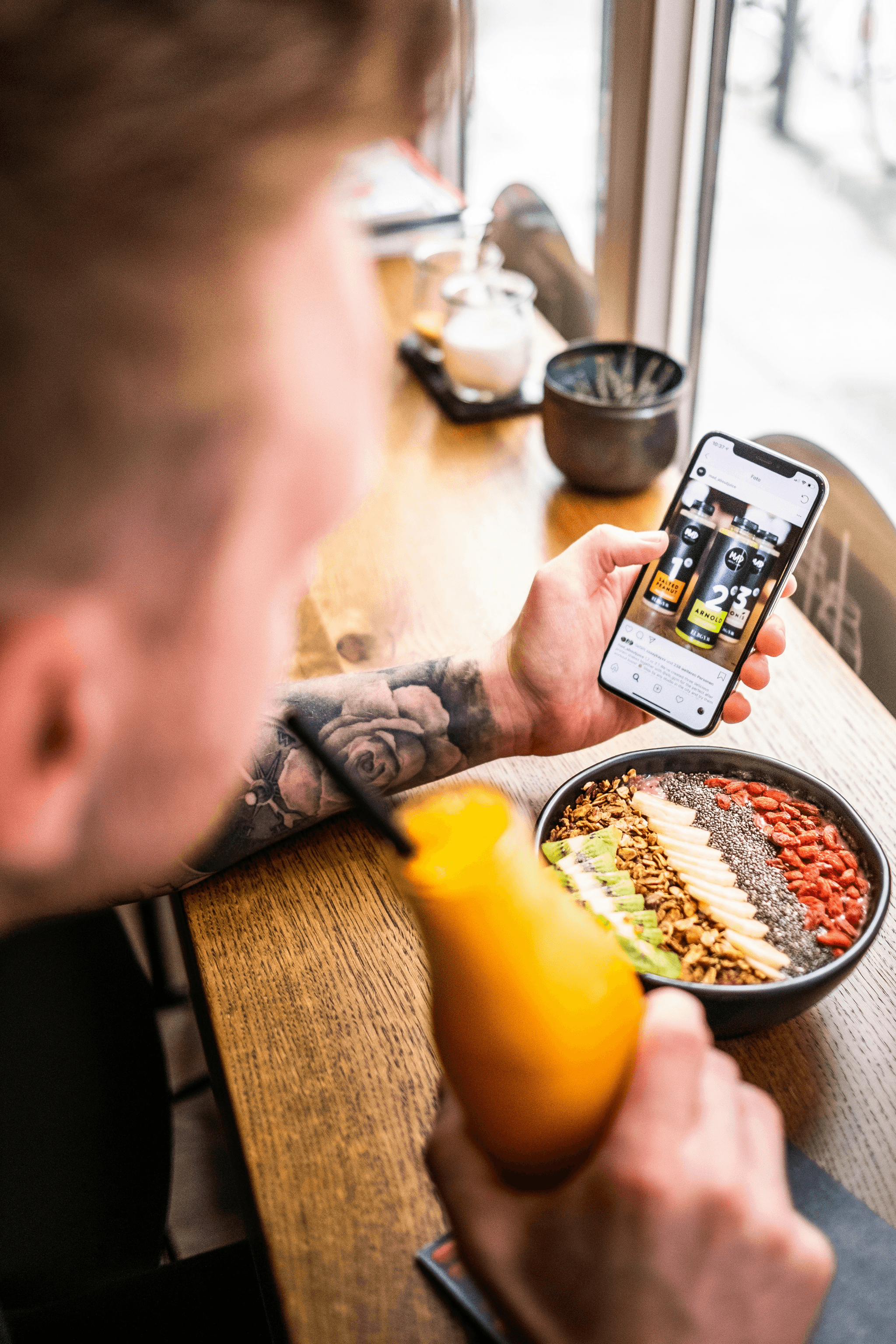 Man eating while checking Yummly