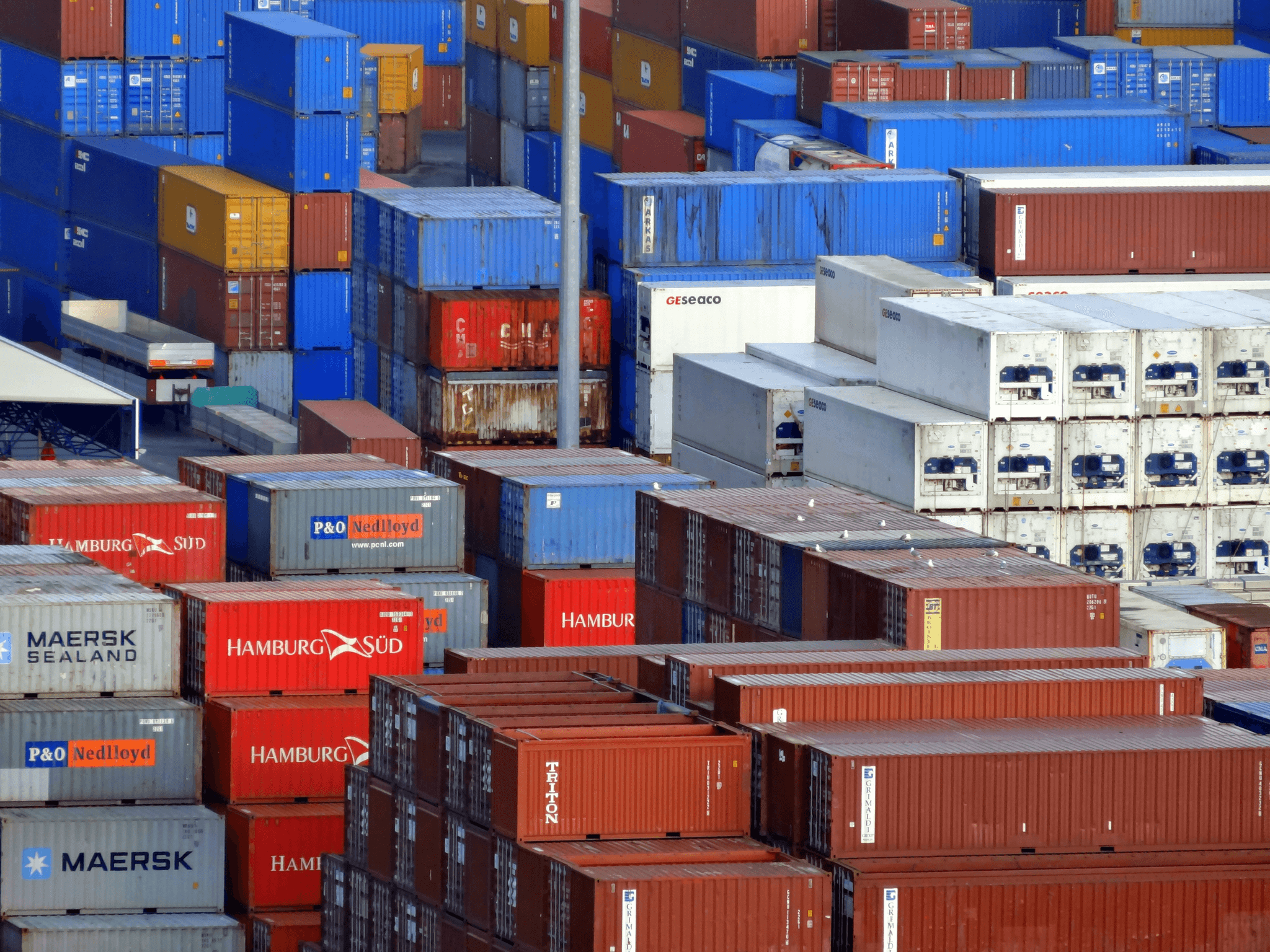 shipping containers on port representing Alibaba shipping solutions.