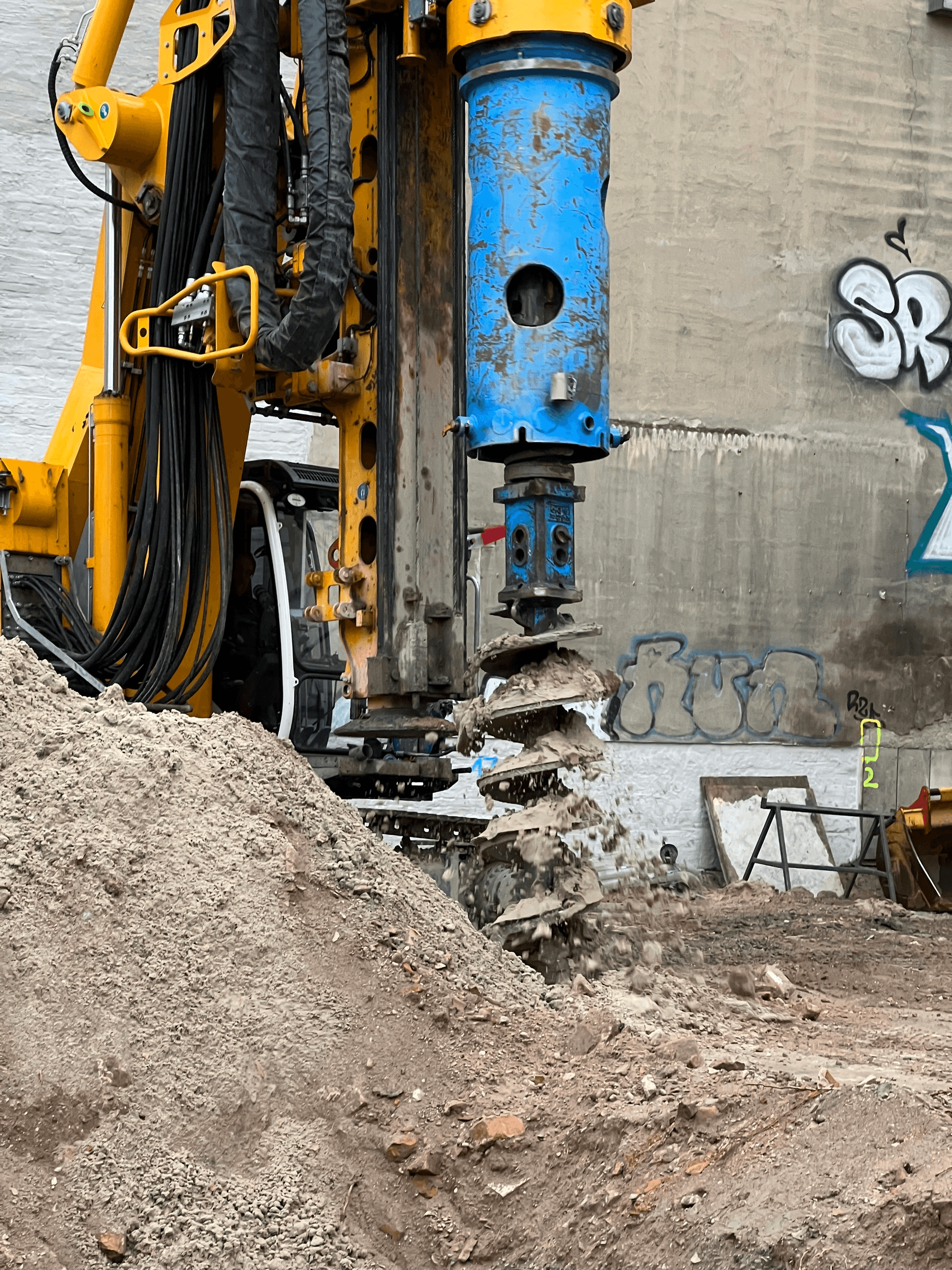 Illustration of down hole drilling equipment on a construction site