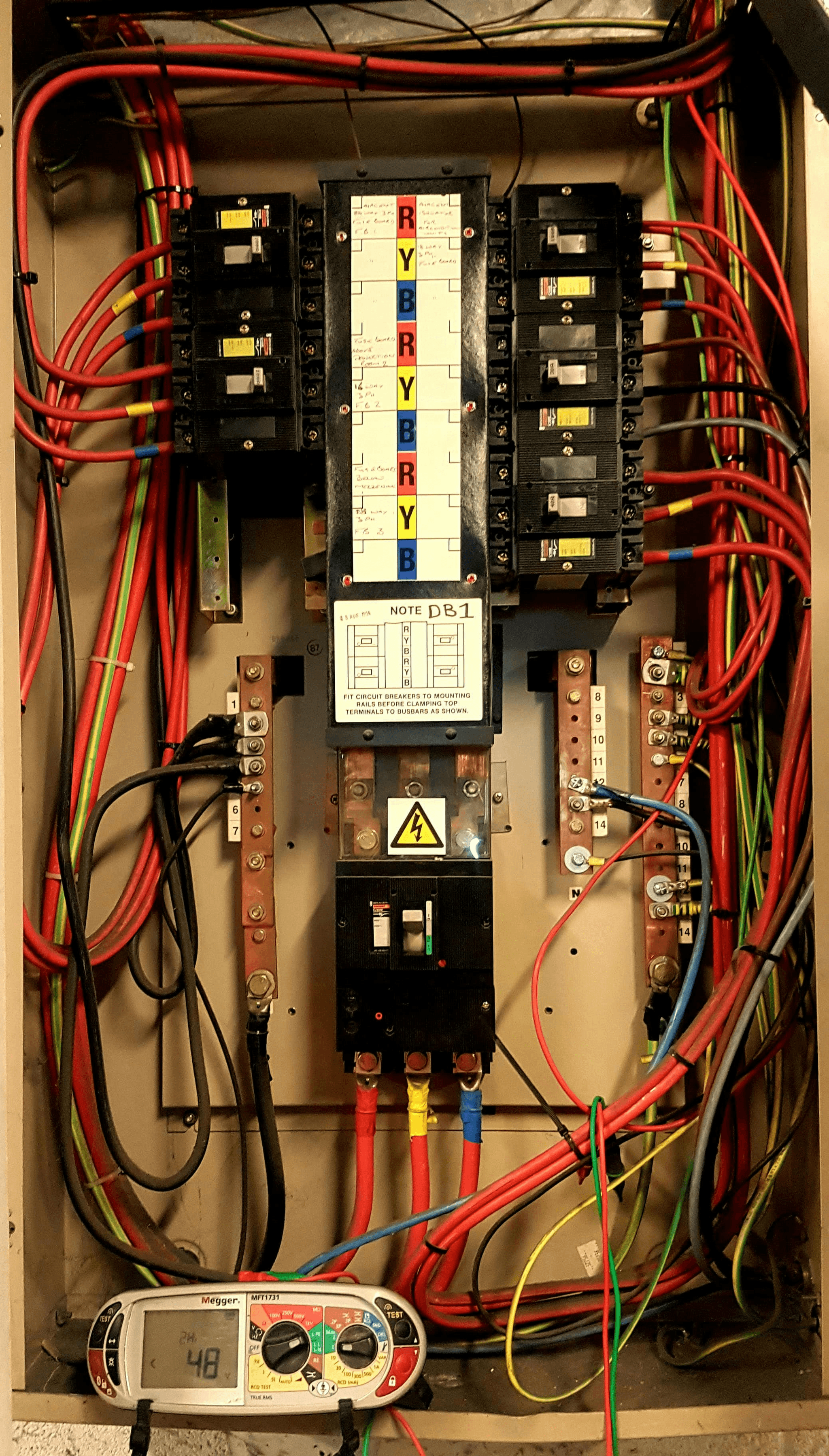 Control panel inspection with wiring and insulation analysis.