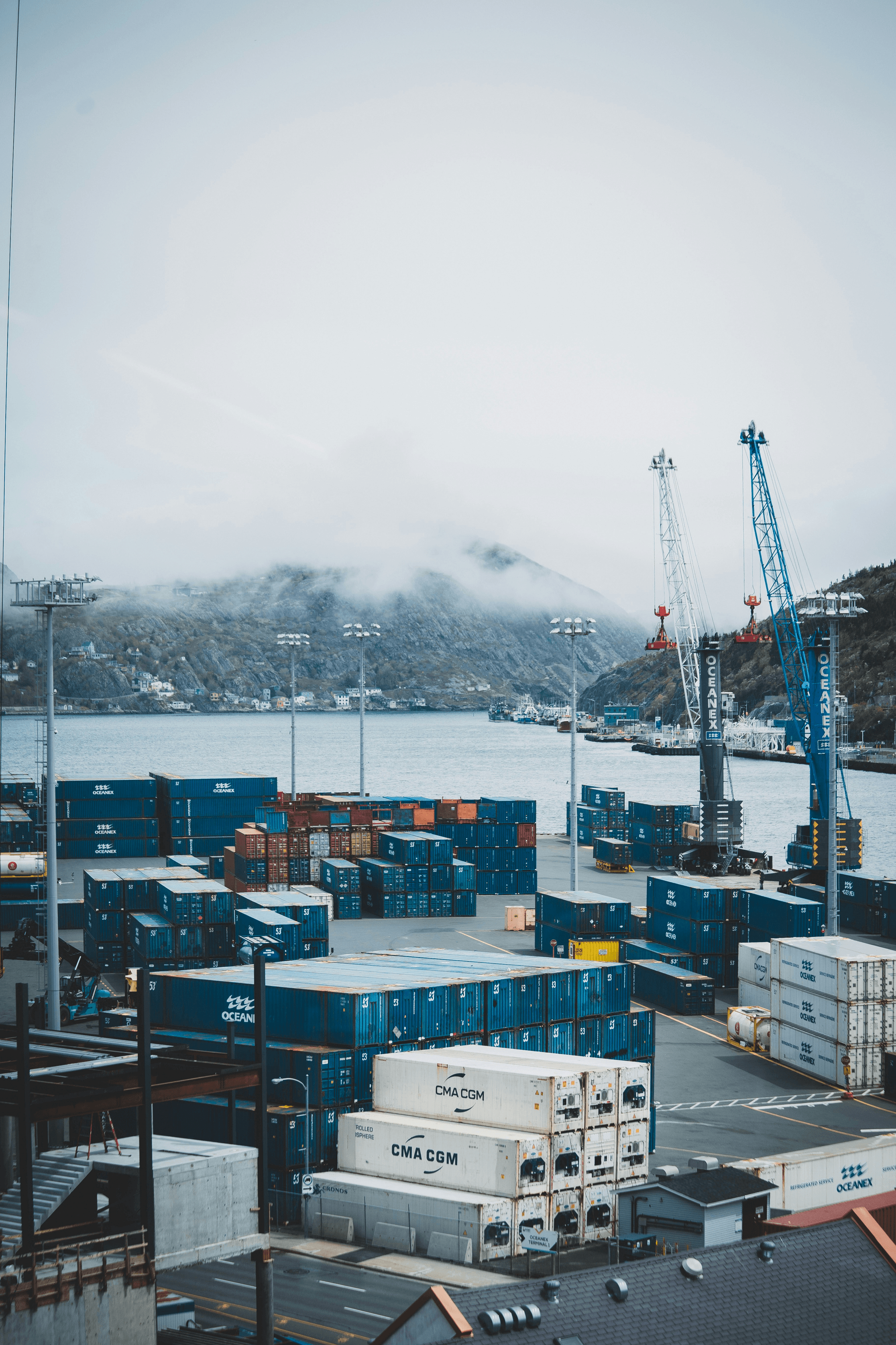 Import export china - Shipping containers being loaded onto a cargo ship