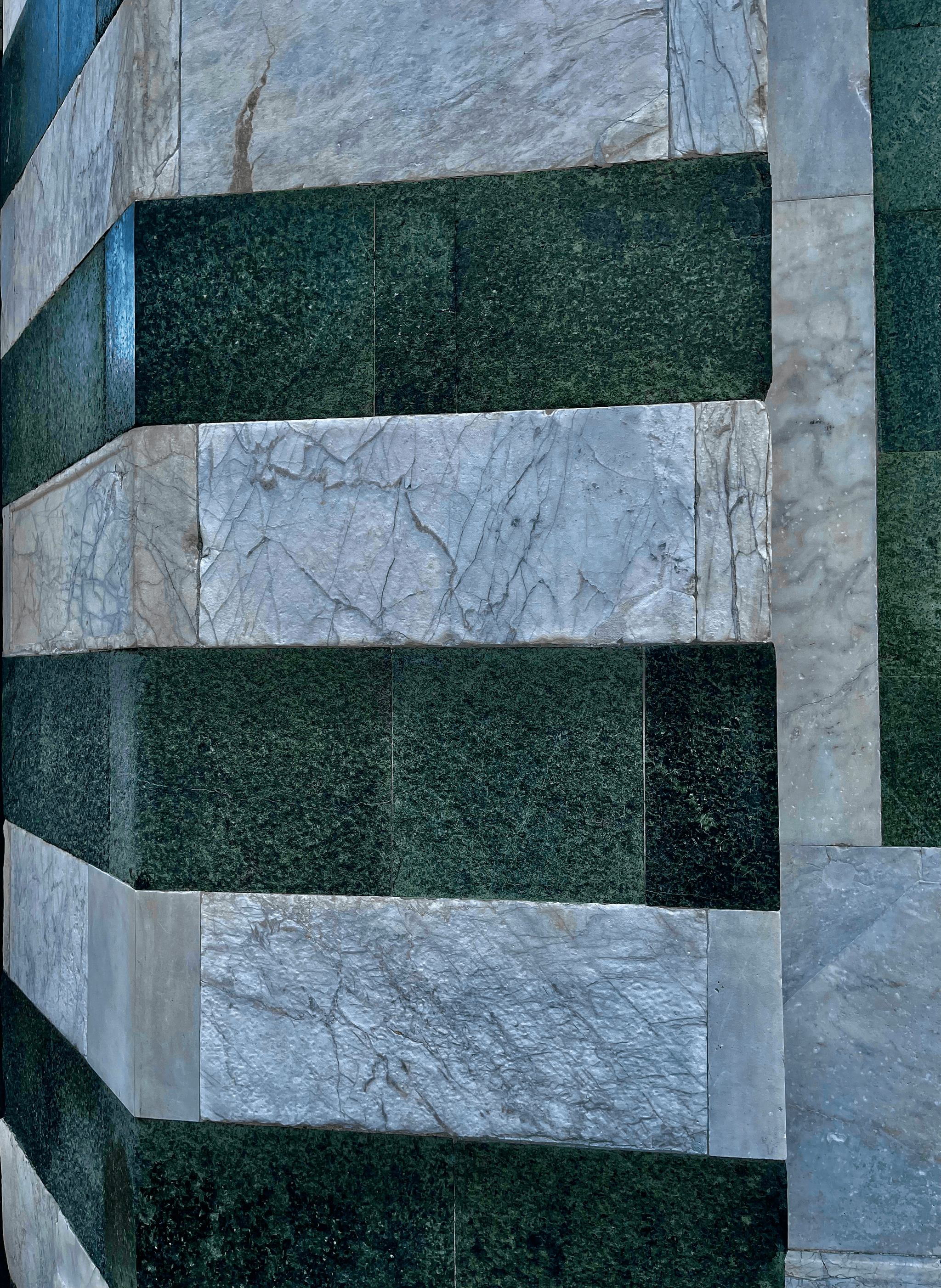 Luxurious and elegant white marble tile backsplash with natural variations - different kinds of tiles