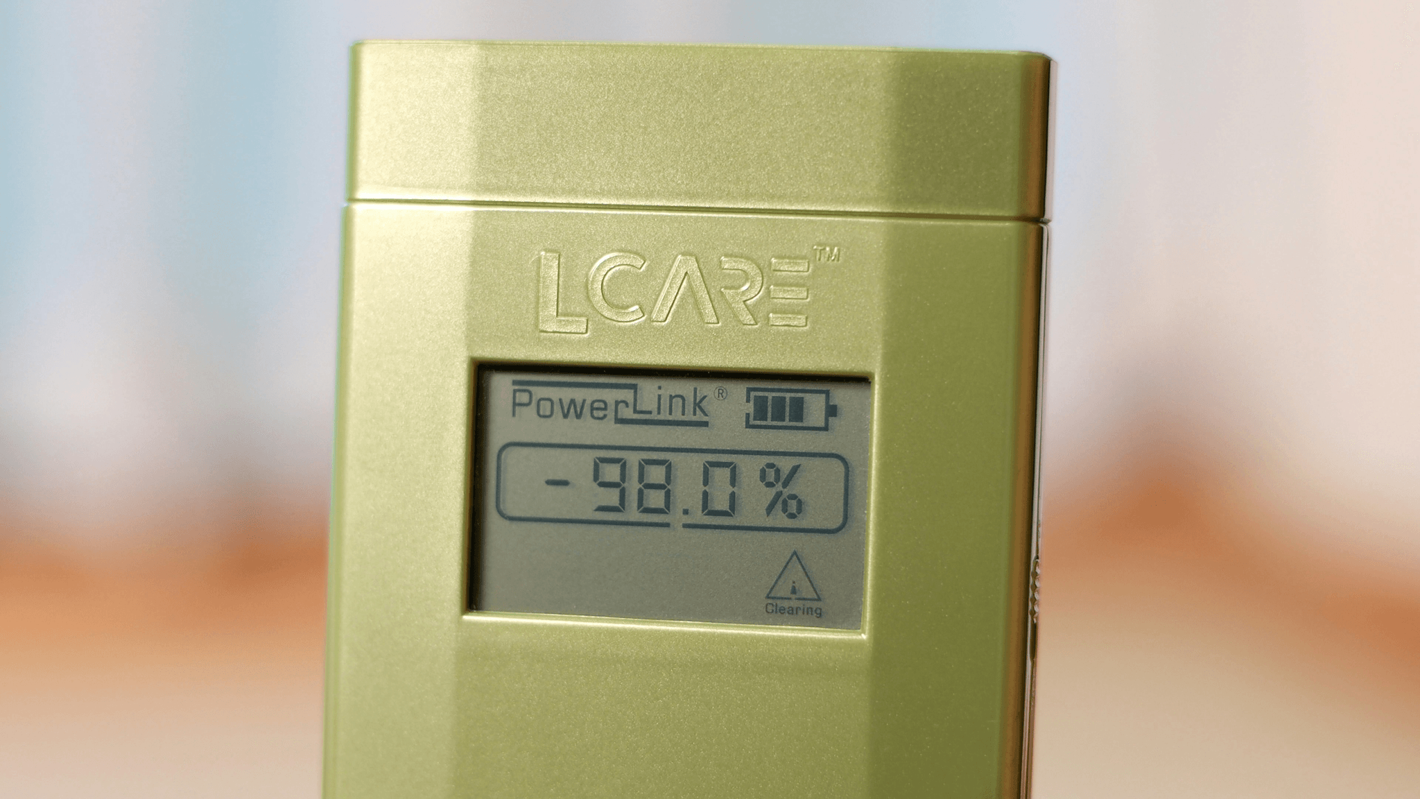 Digital moisture meter measuring wood moisture content in workshop}