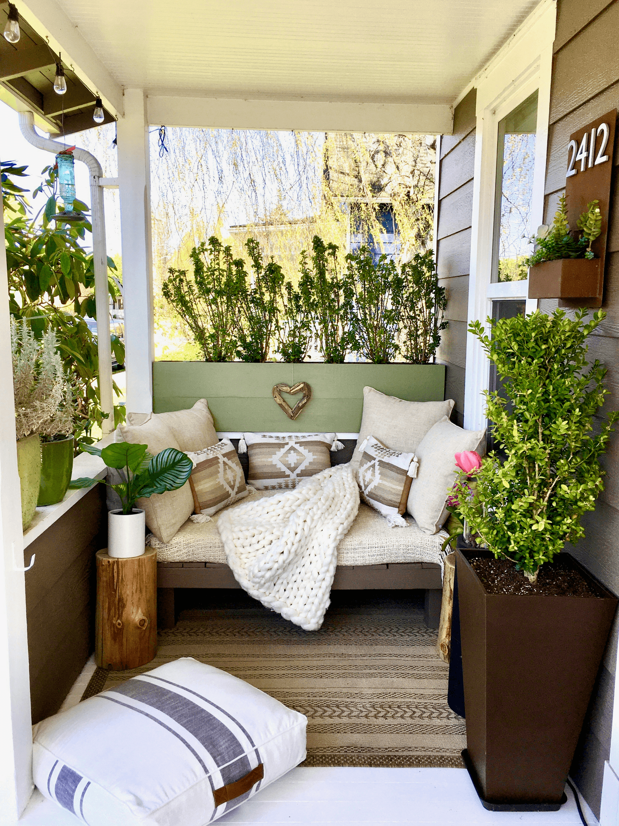 cozy porch area outside mobile home with inviting decor