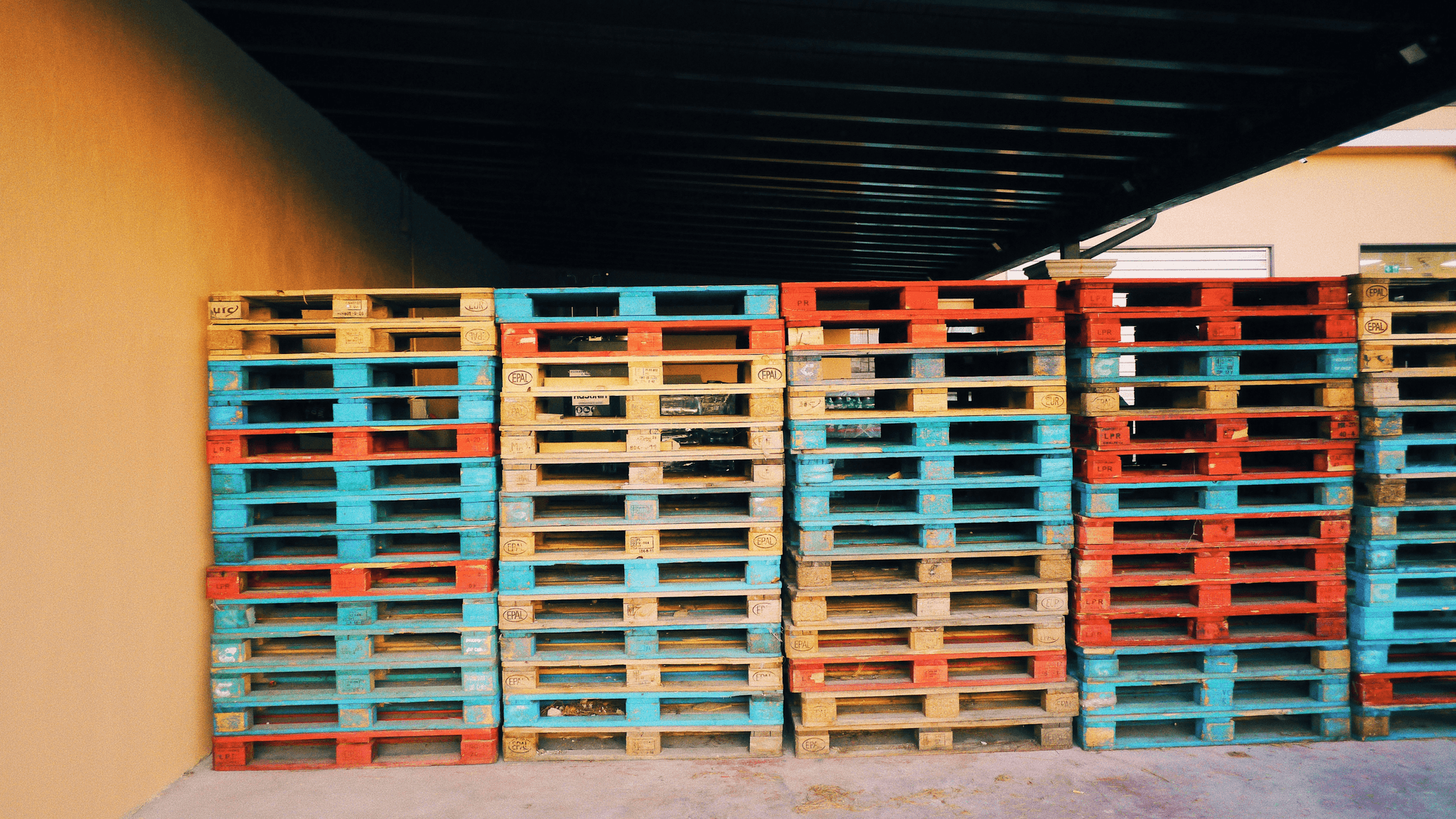 folding containers displayed prominently in an organized warehouse setting