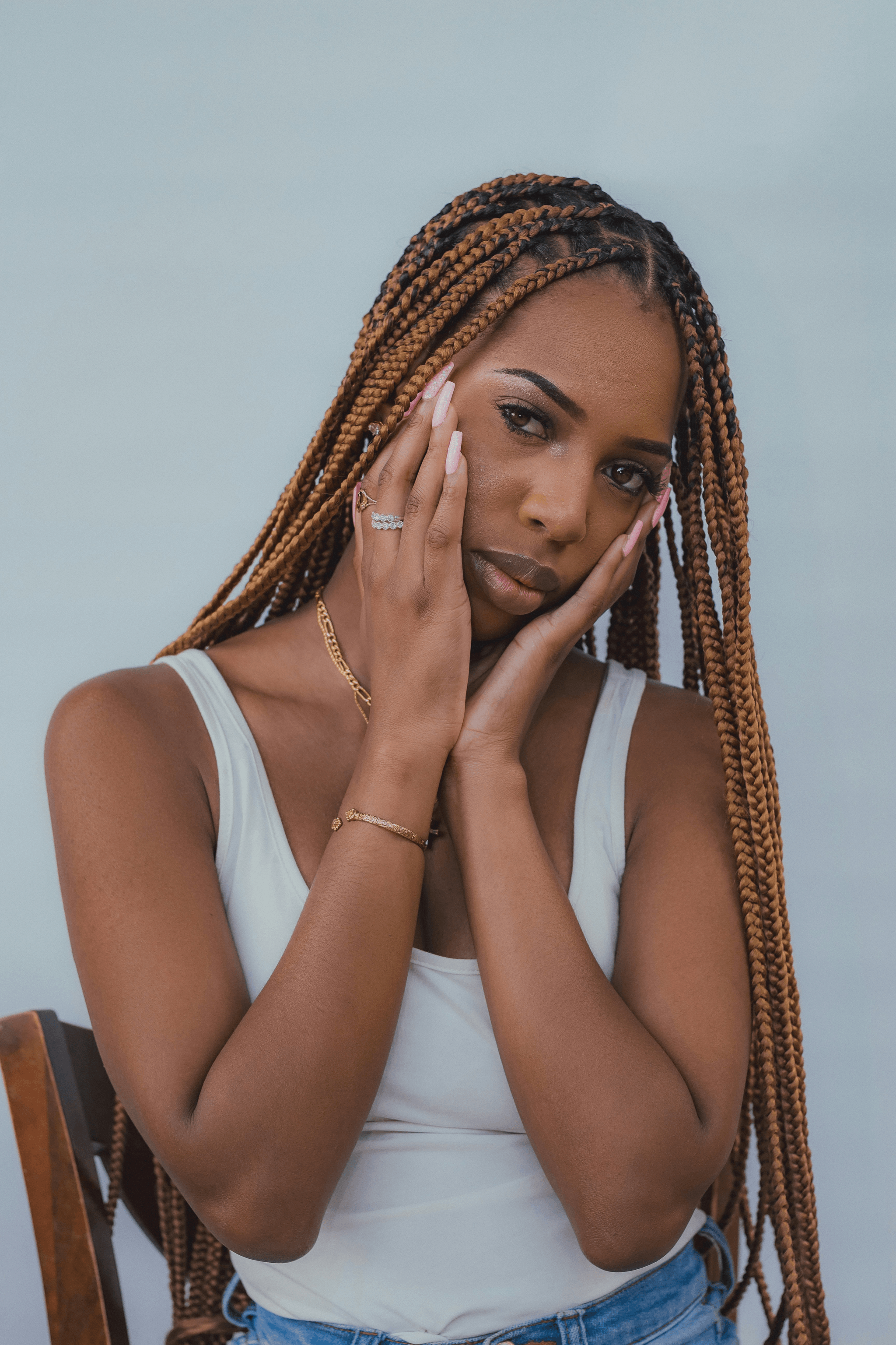 Stylish woman flaunting wholesale braid hair in trendy box braid style.