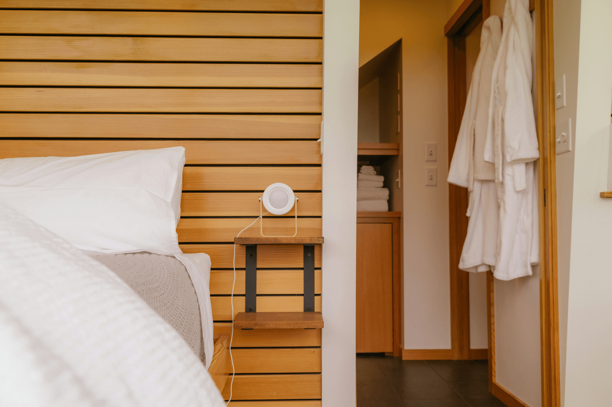 Modern hotel room with tech integration at prefab hotel