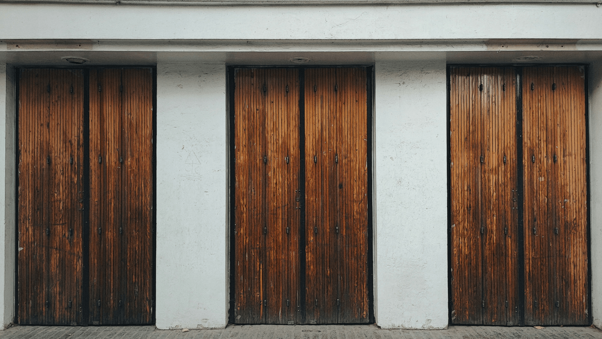 Garage Door Inspection showcasing various styles including Folding Garage Door