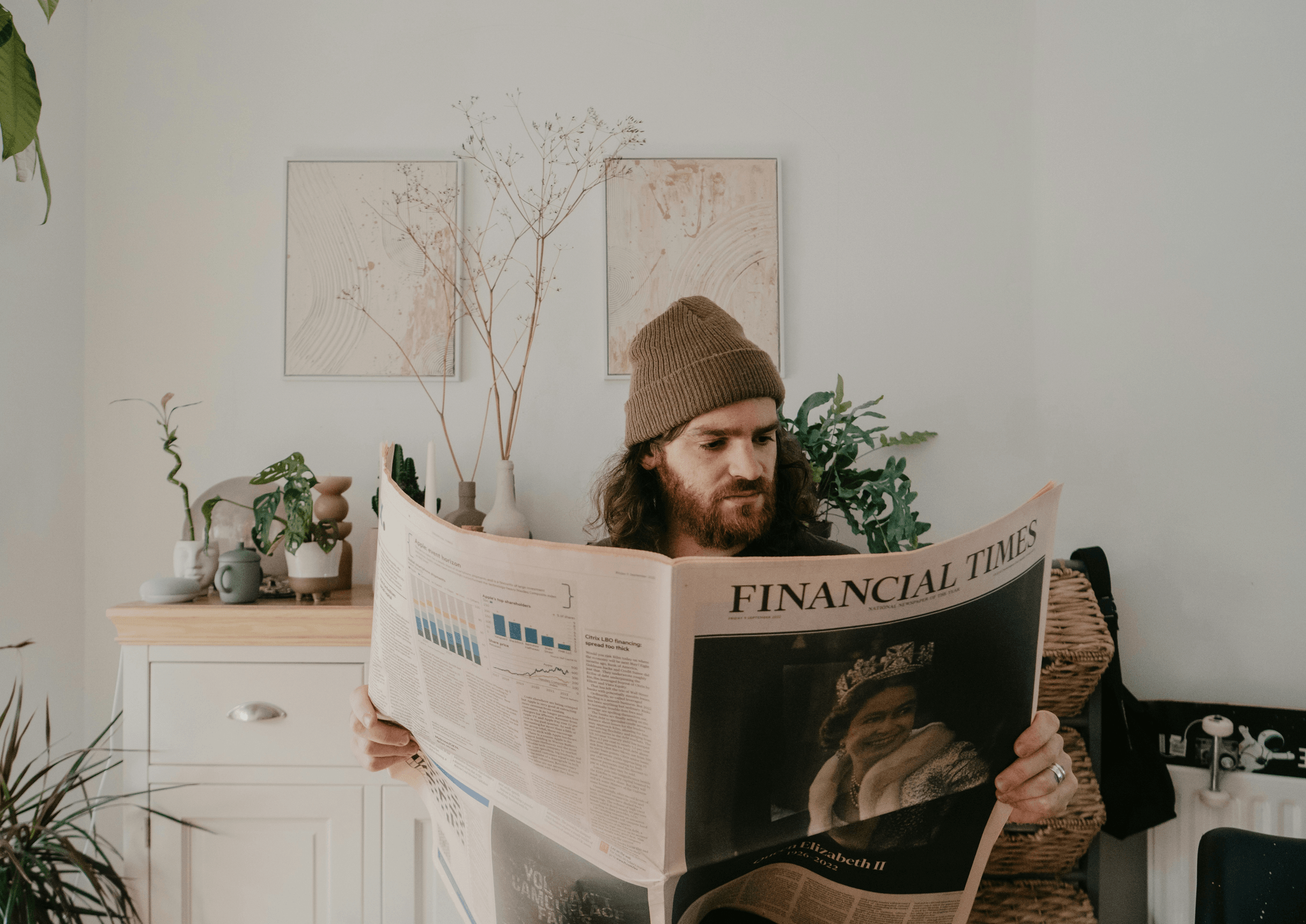 Print media newspaper reader engaging with trustworthy content