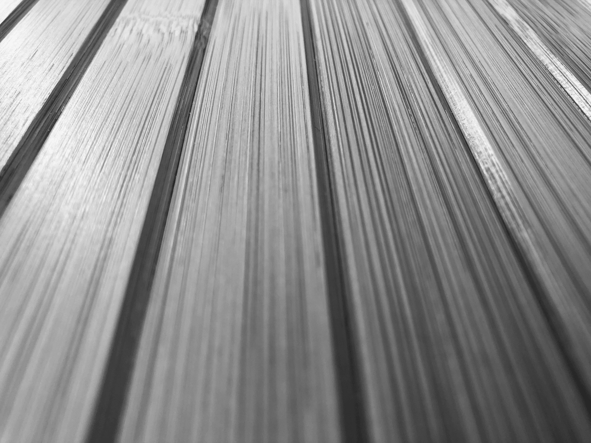 Visual representation comparing Rigid Core Vinyl vs SPC flooring styles.