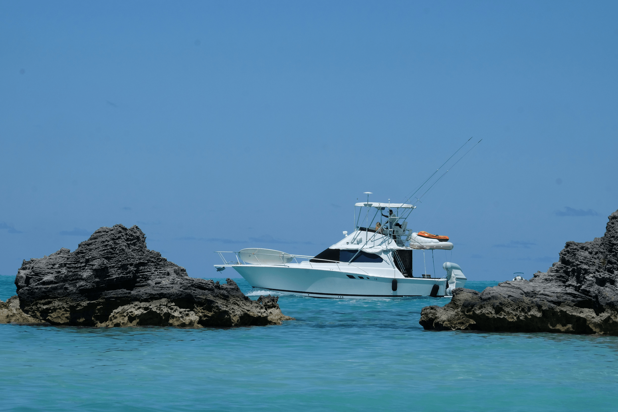 Luxury aluminum fishing boat sailing through clear waters