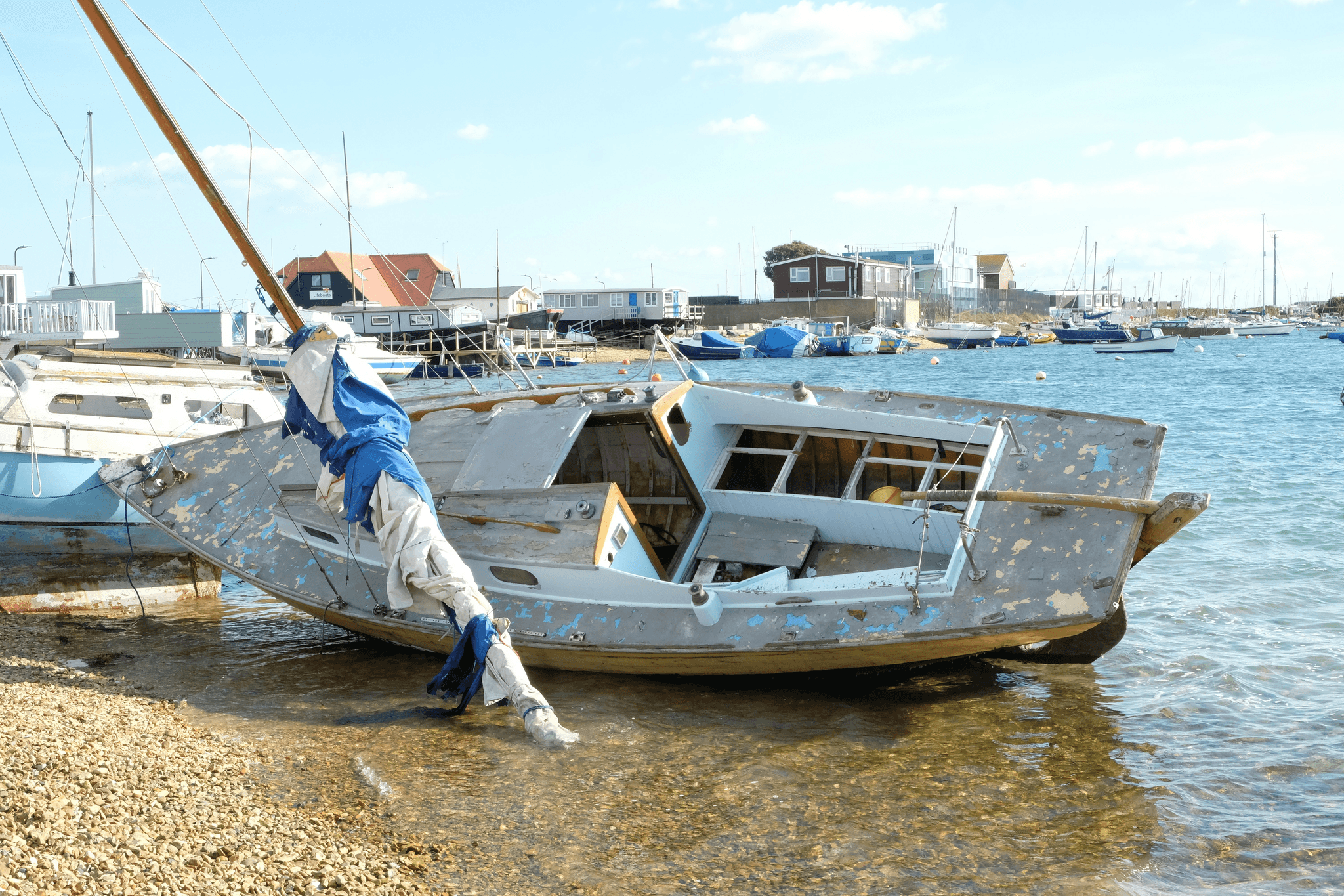 Small aluminum boat being properly maintained