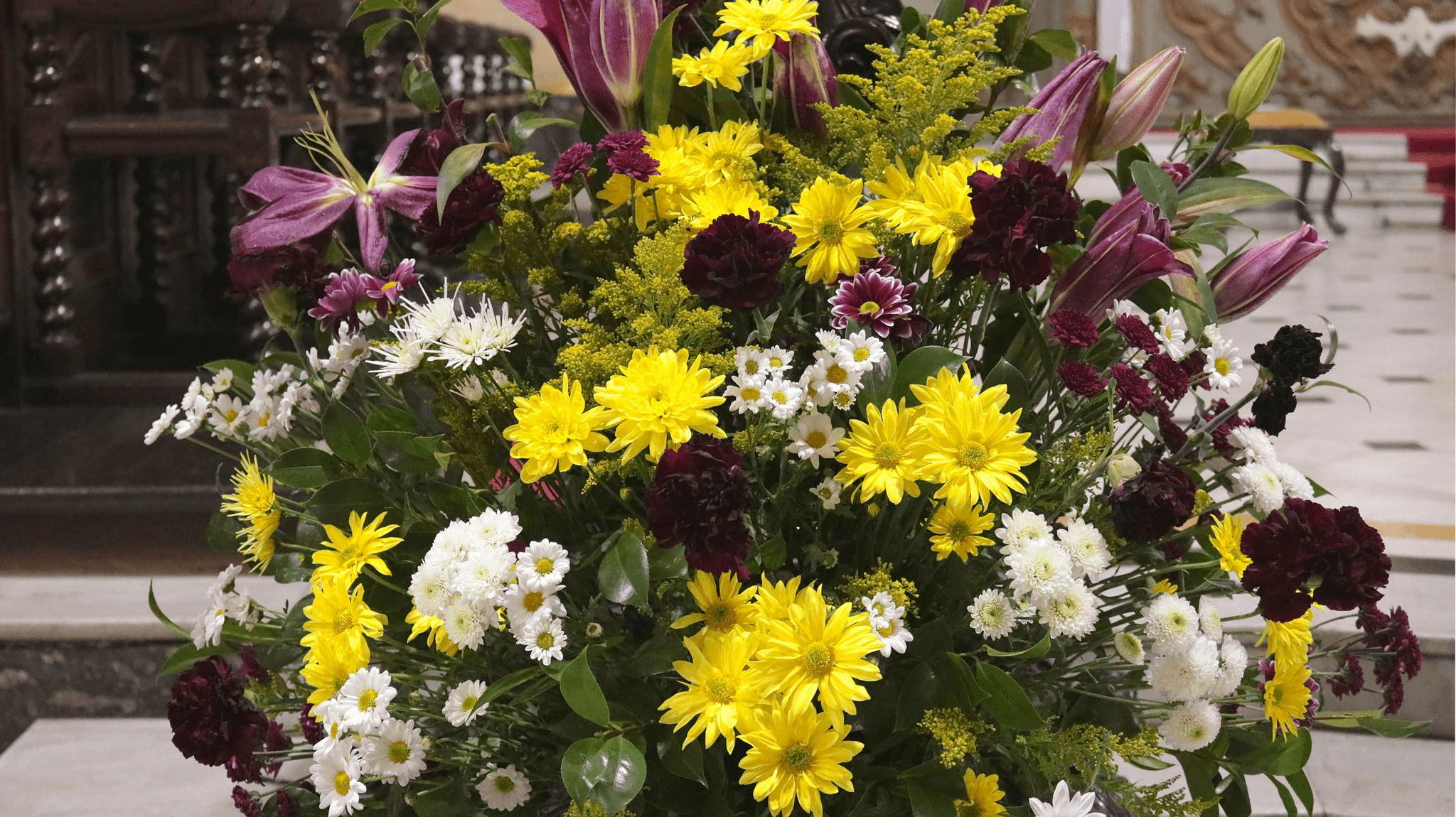 what color flowers for death anniversary: beautiful sympathy flower arrangements