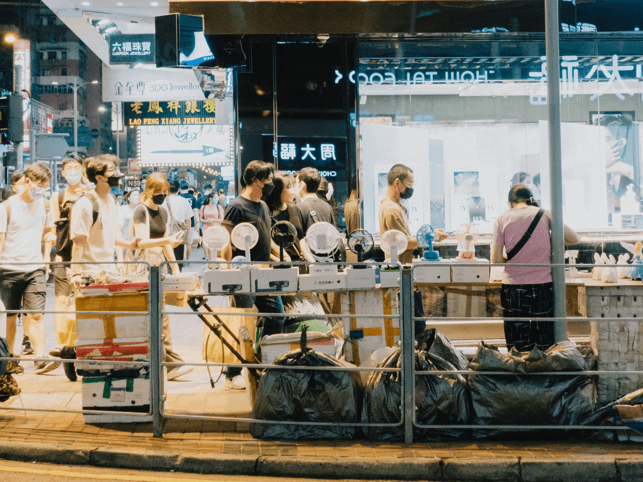 Shoppers exploring diverse electronic products at Shenzhen electronics market
