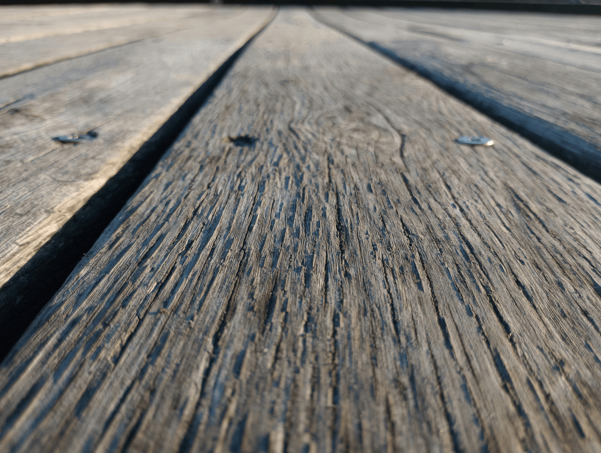 Different styles of thick decking boards ready for construction.