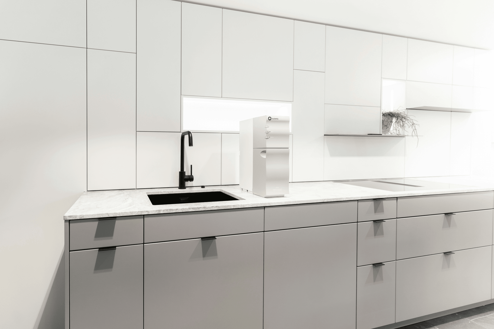 Gloss Kitchen Cabinets in Modern White Kitchen