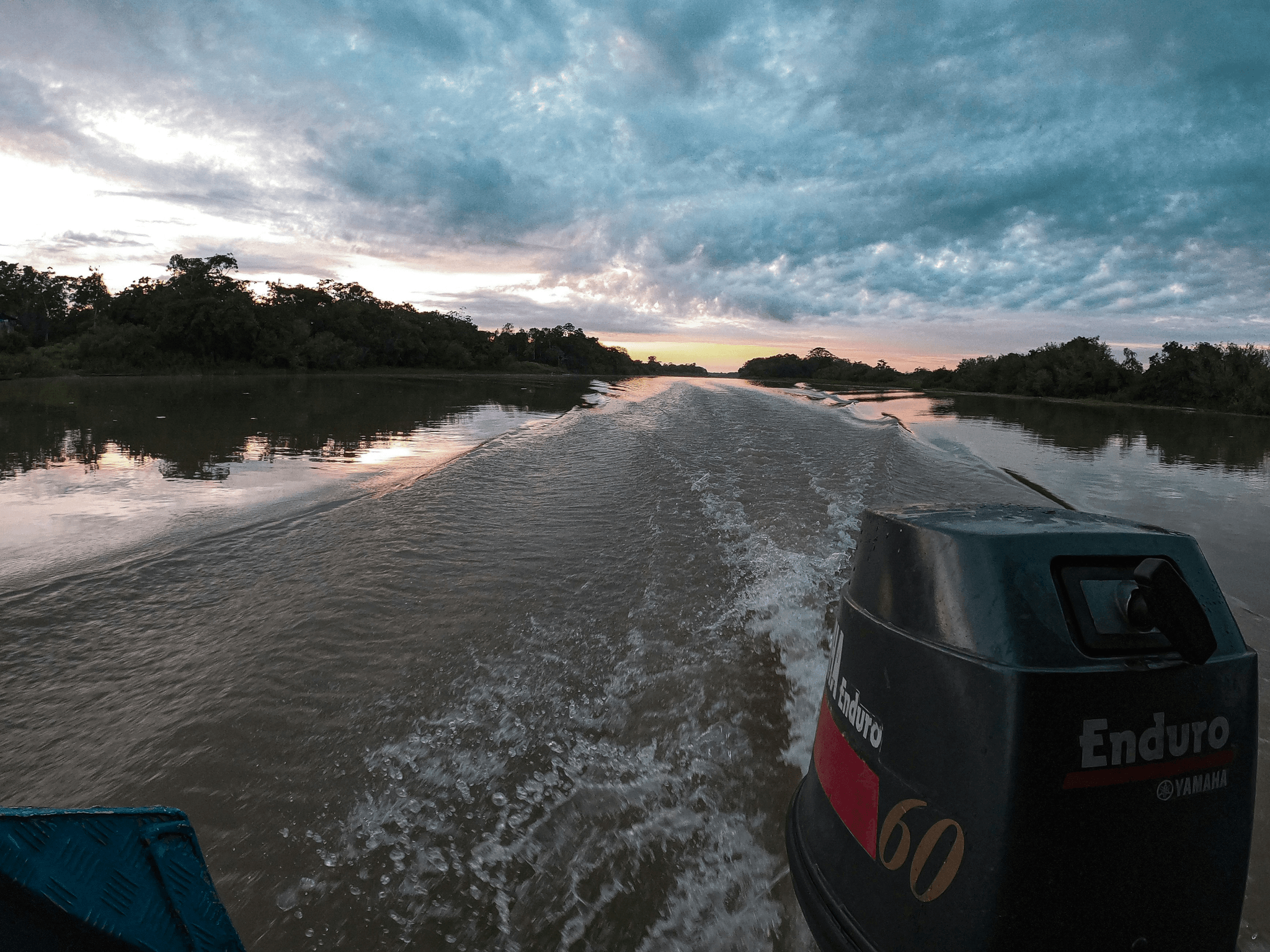 V bottom aluminum boat navigating through choppy waters