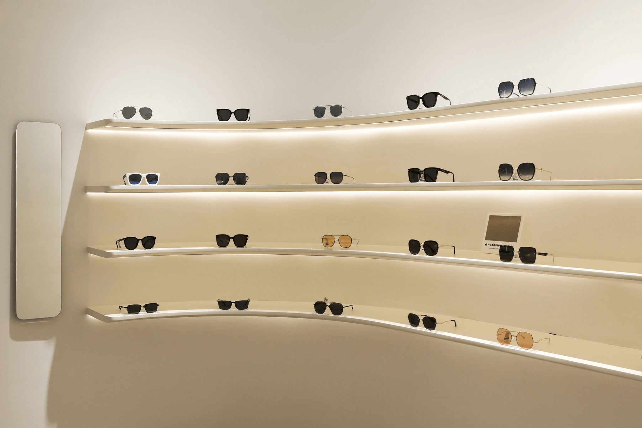 Stylish sunglasses in bulk displayed on shelves