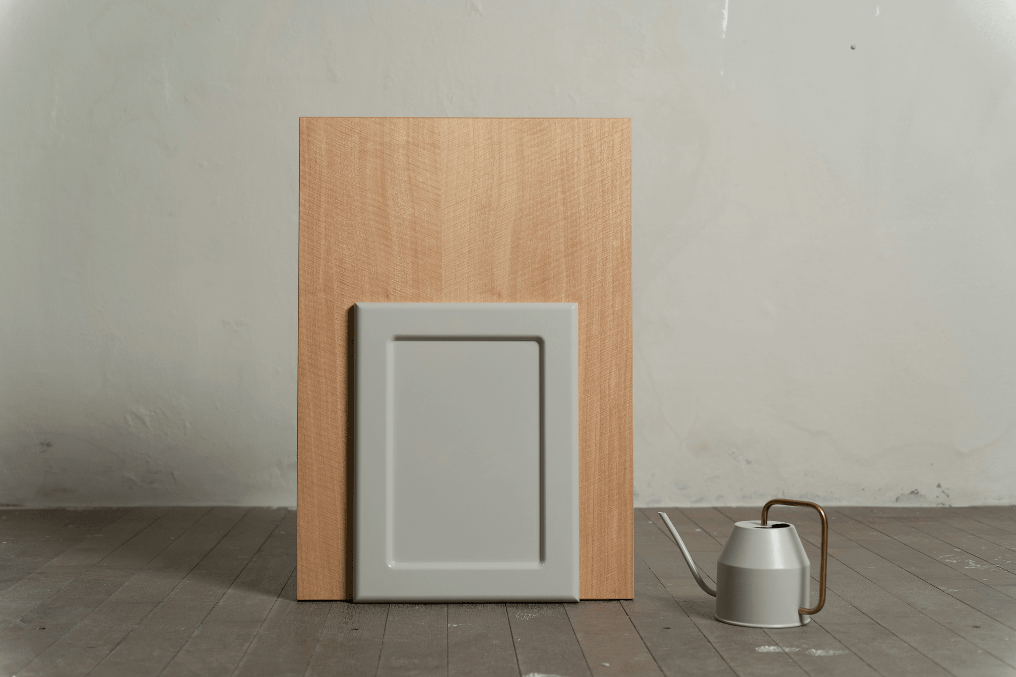 Comparison of traditional wood vs PVC cabinet doors in kitchen