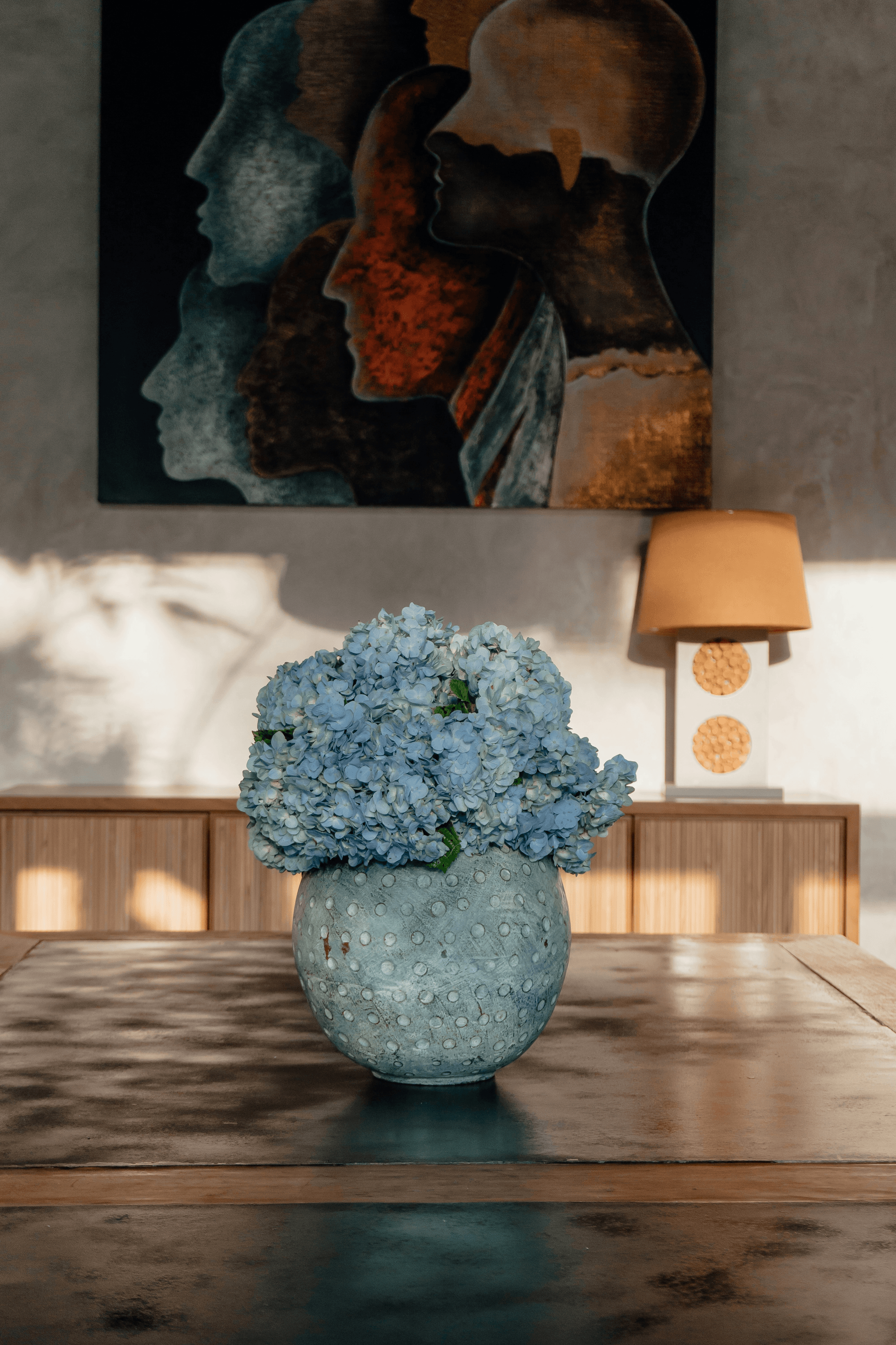 Beautiful table centerpiece with dried pink and green hydrangea flowers