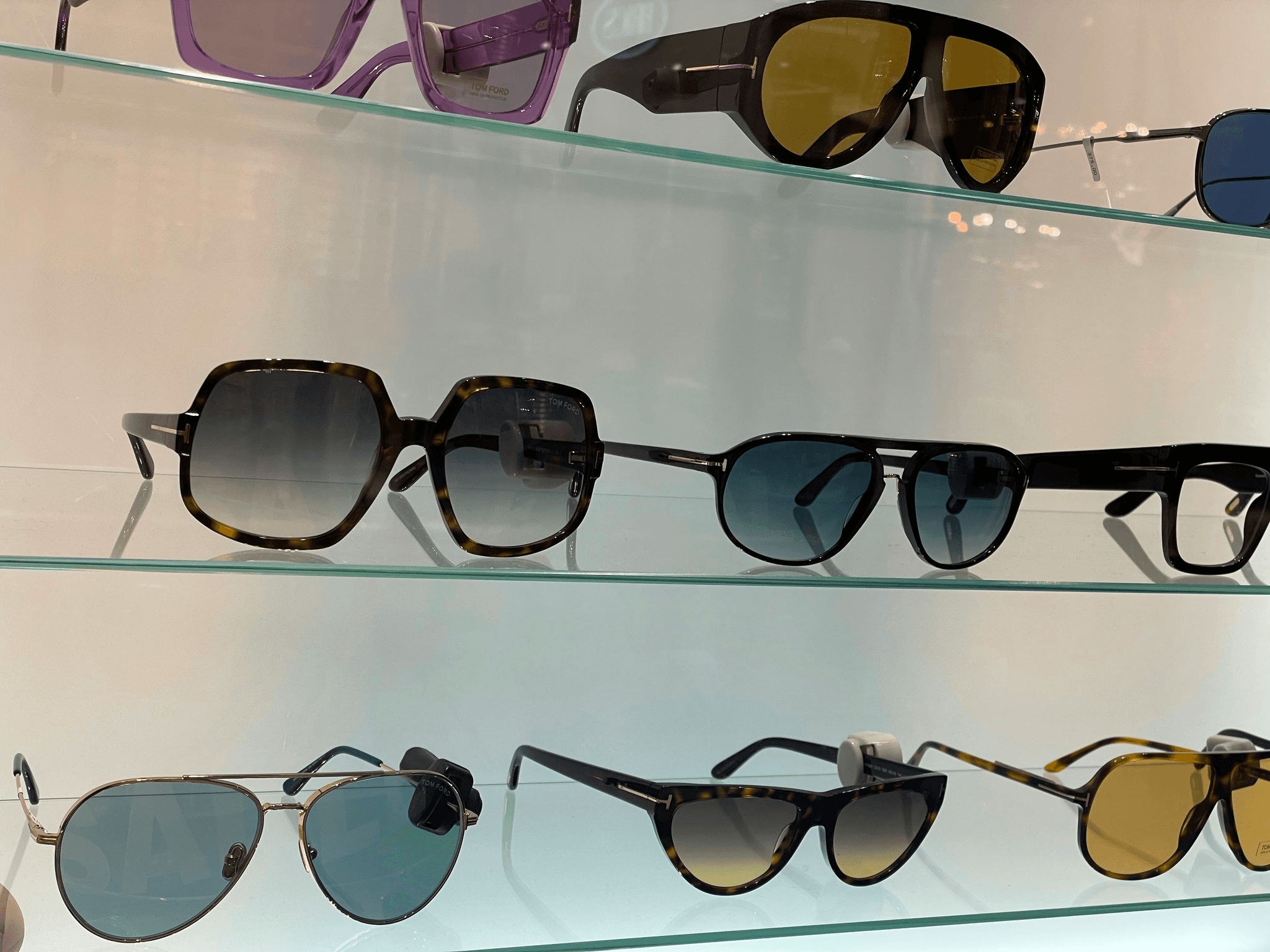 bulk custom sunglasses displayed at outdoor event