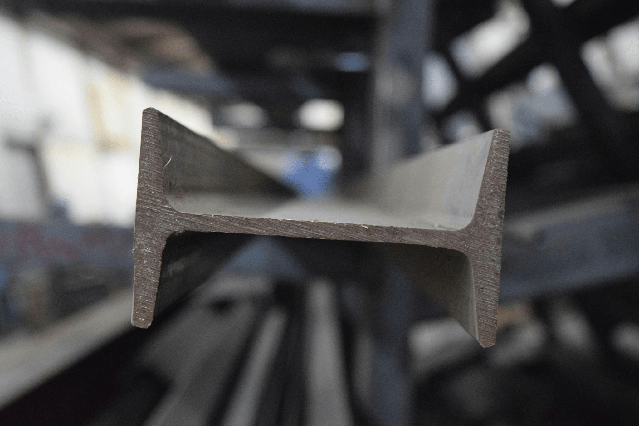 Steel beams and tools in workshop used in DIY home projects