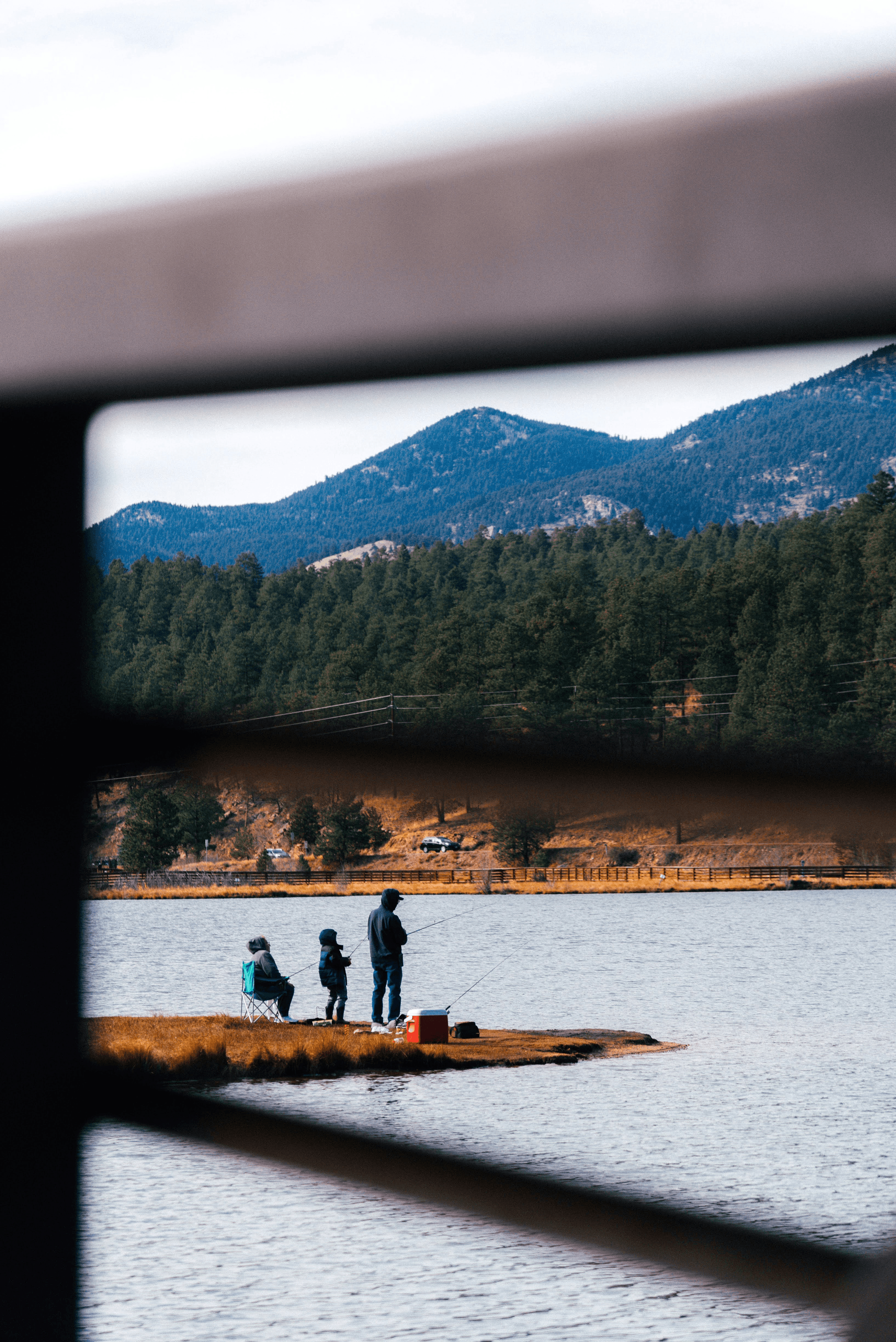 Group enjoying freshwater fishing boat