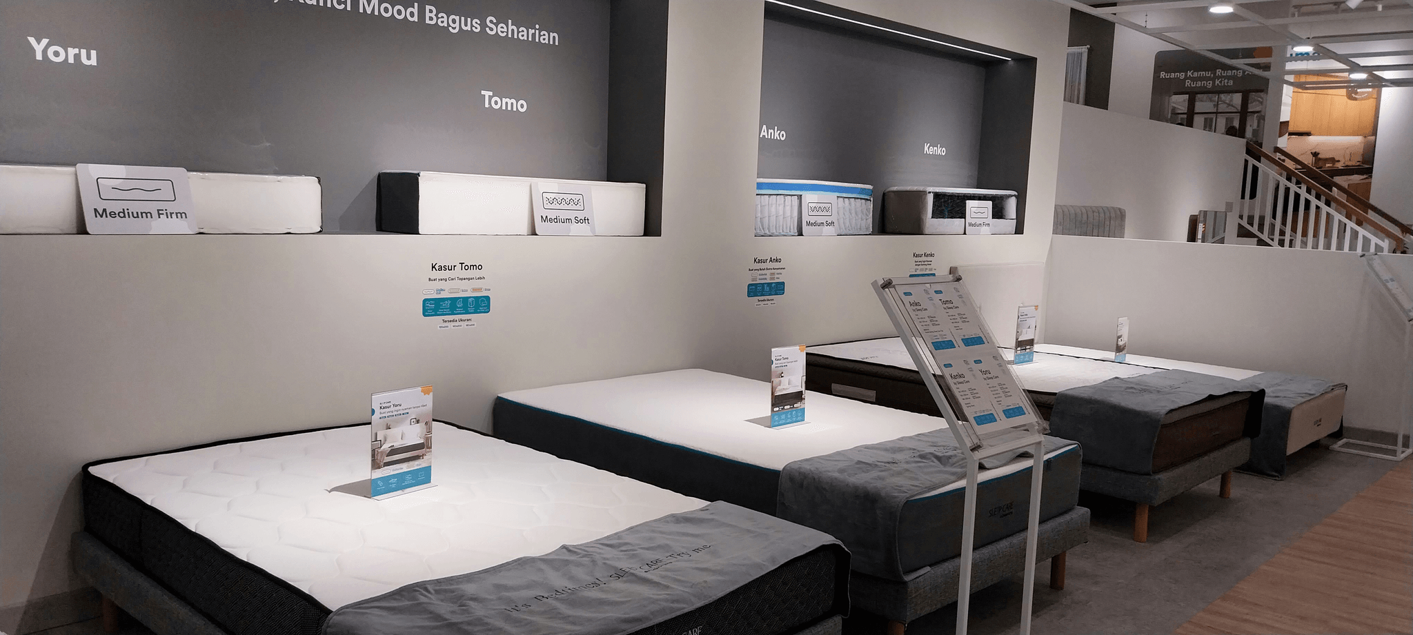 Mattress inspection compliance certifications displayed on showroom mattresses