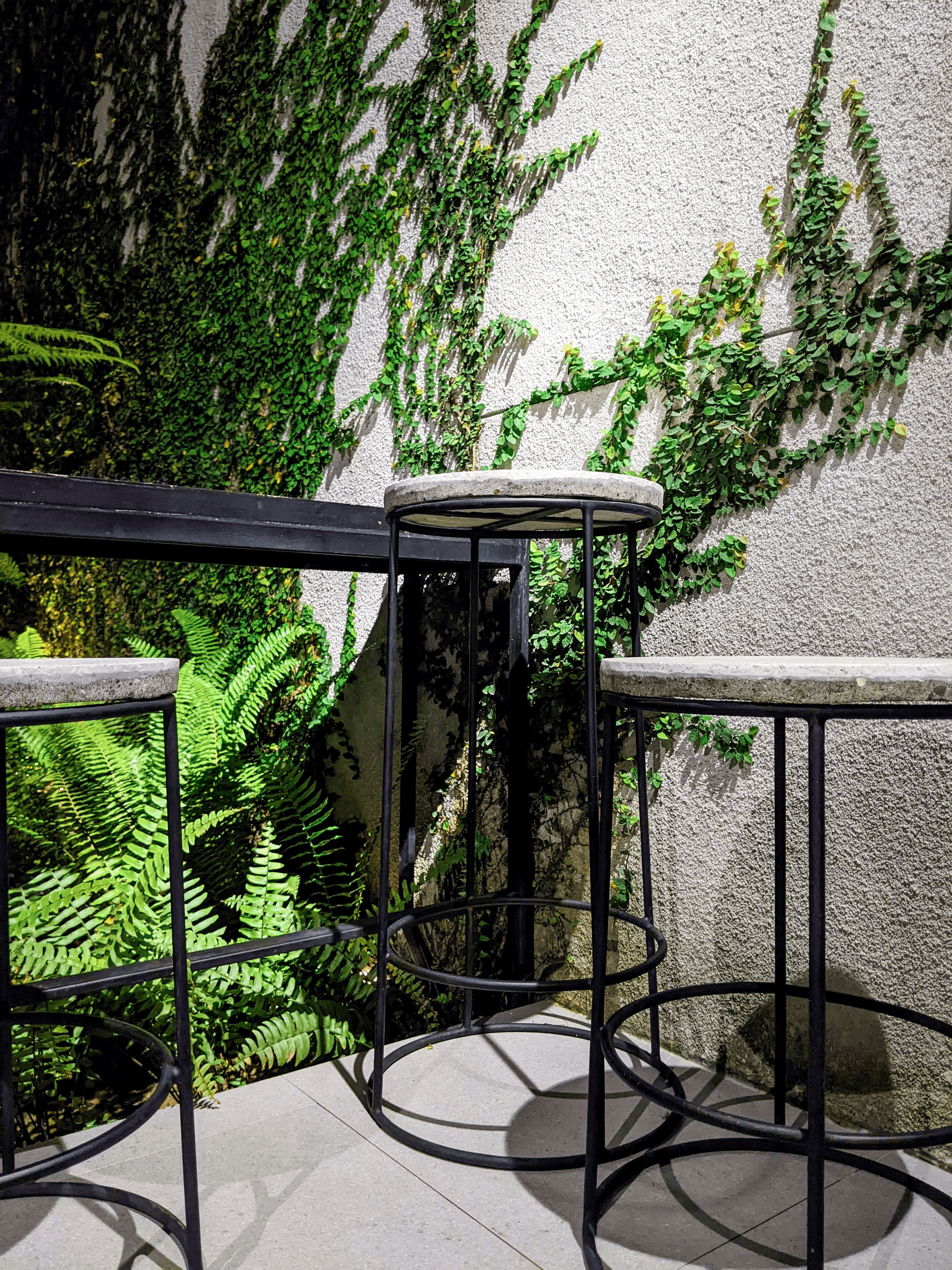 Stylish portable outdoor bar setup with cozy seating arrangements.