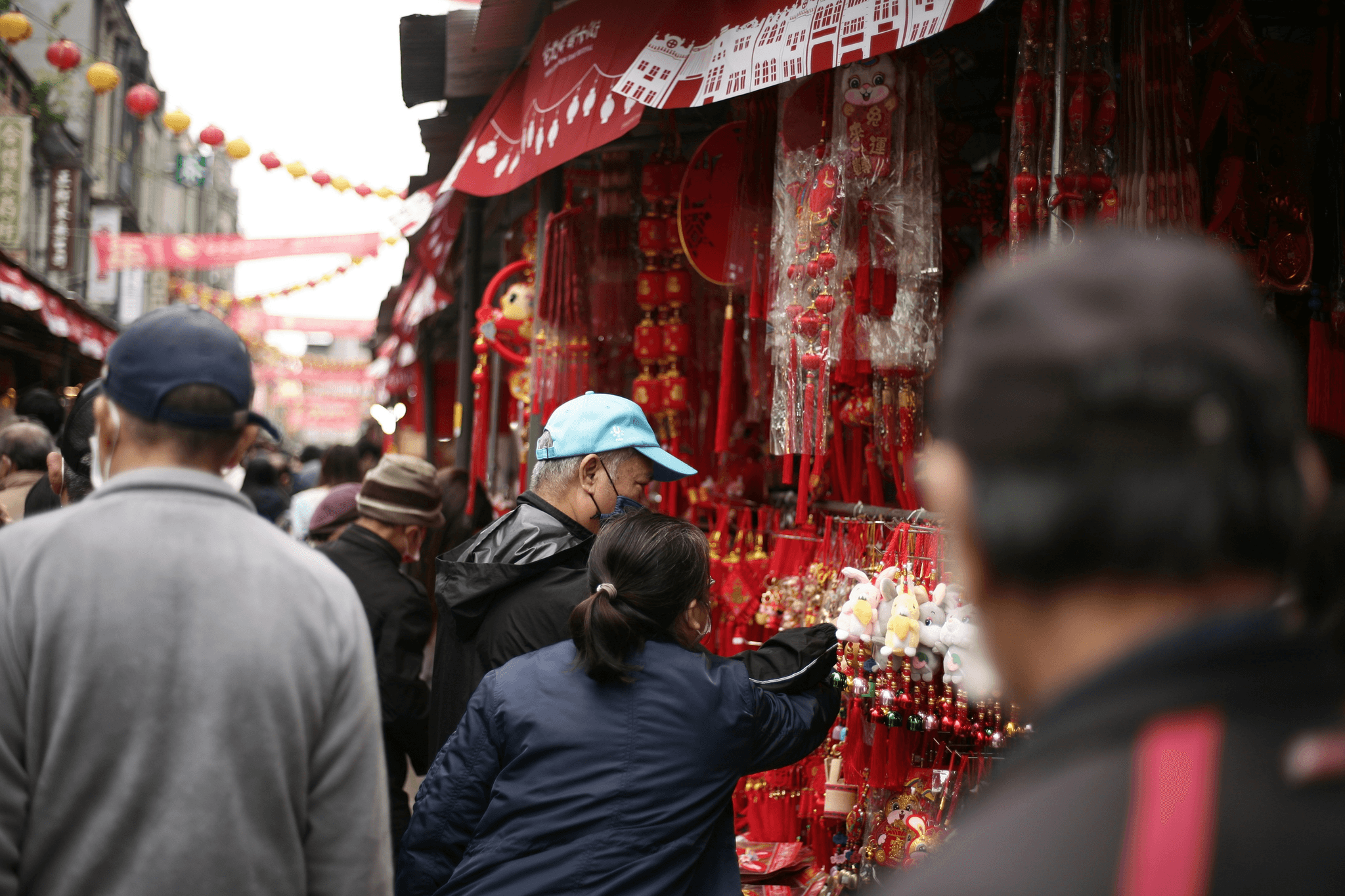 Chinese purchasing agent navigating vibrant marketplace