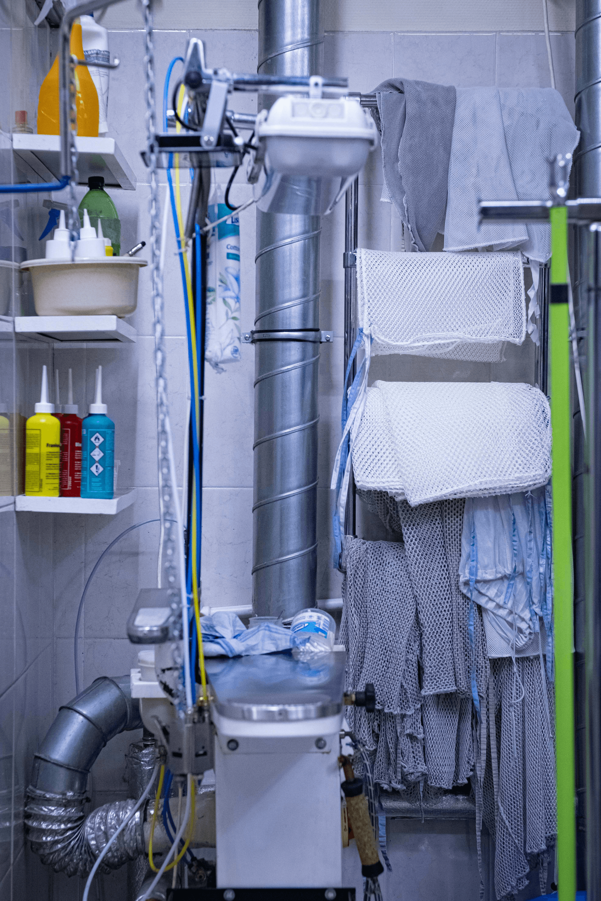 Bathroom towel racks inspection with quality control tools.