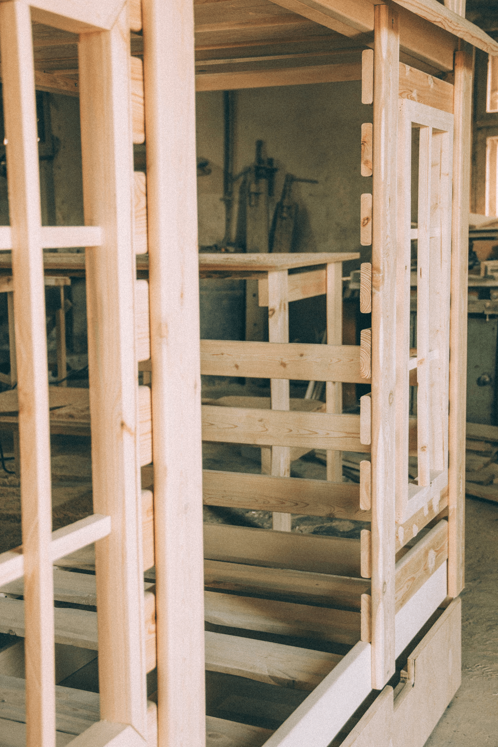Skilled installer working on Ash Cabinets