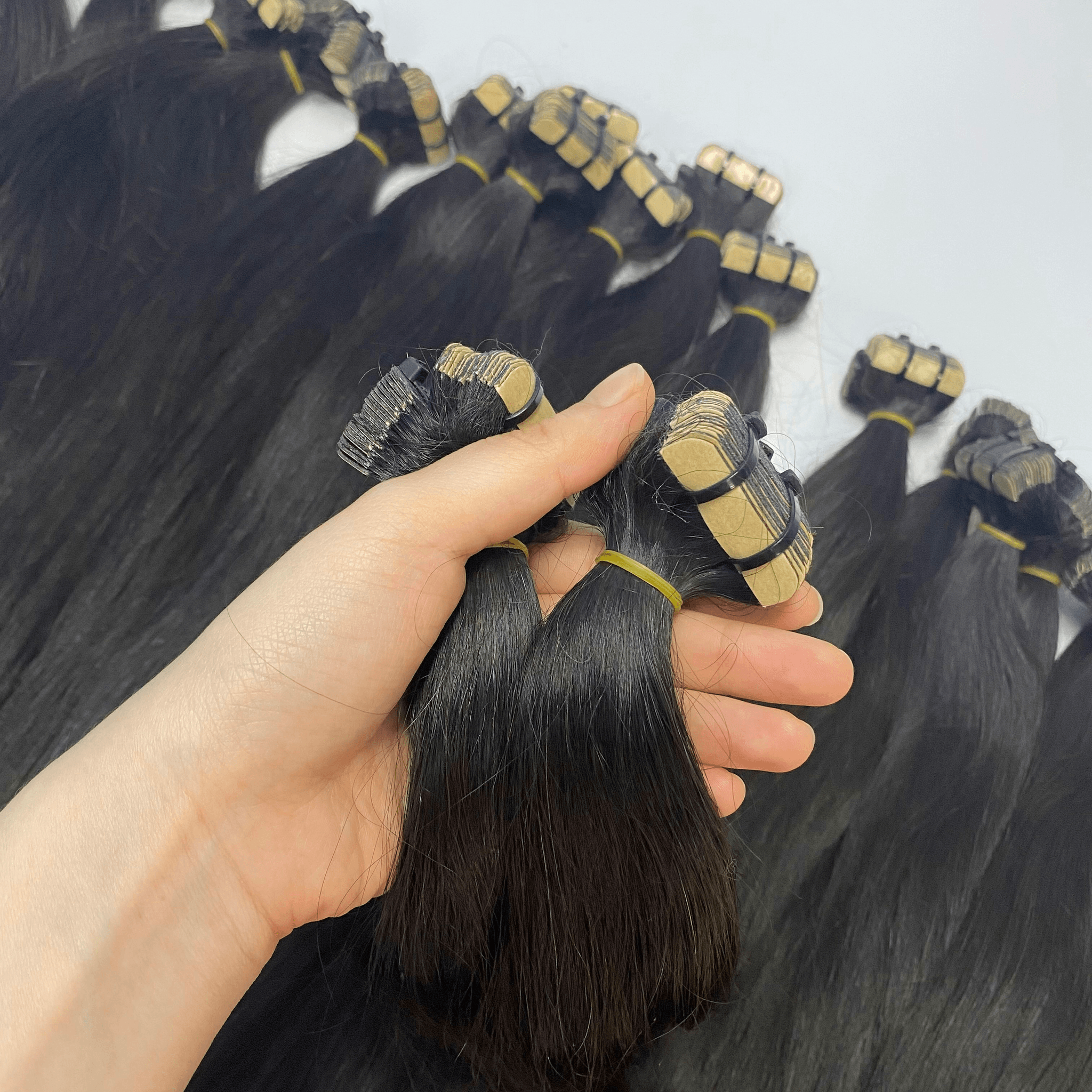 different types of hair extensions for black hair showcased through micro-link installation