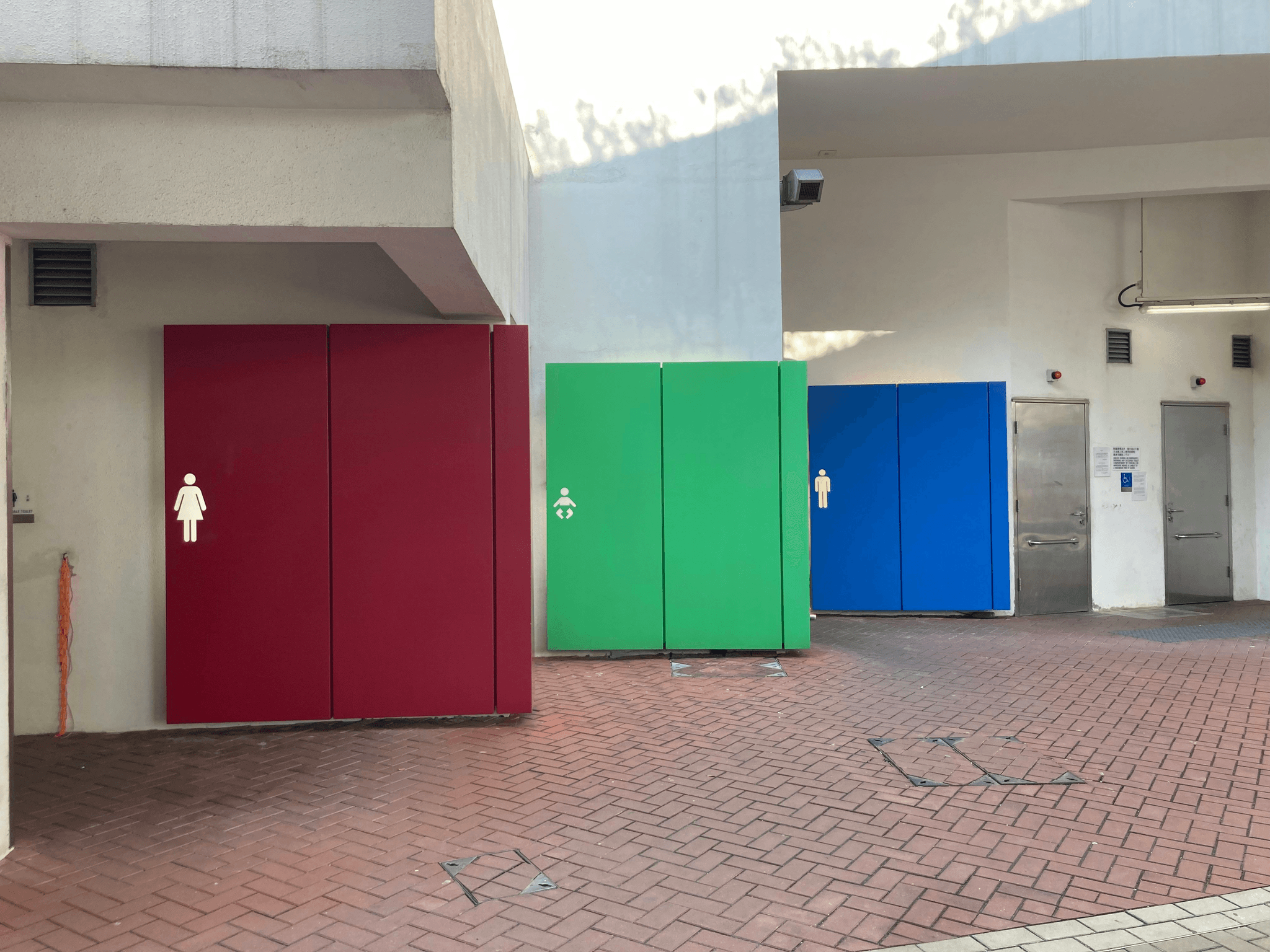 prefabricated restroom buildings showcased in a public park setting