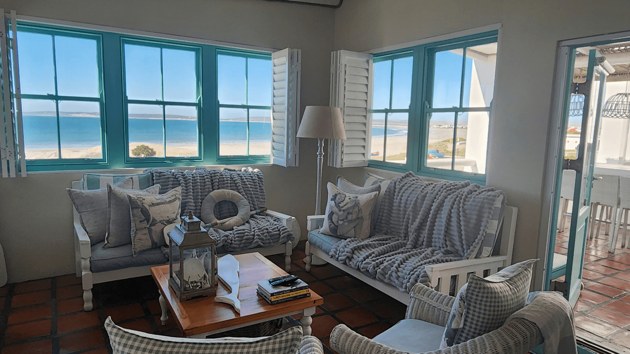 Prefabricated beach house with open floor plan overlooking ocean