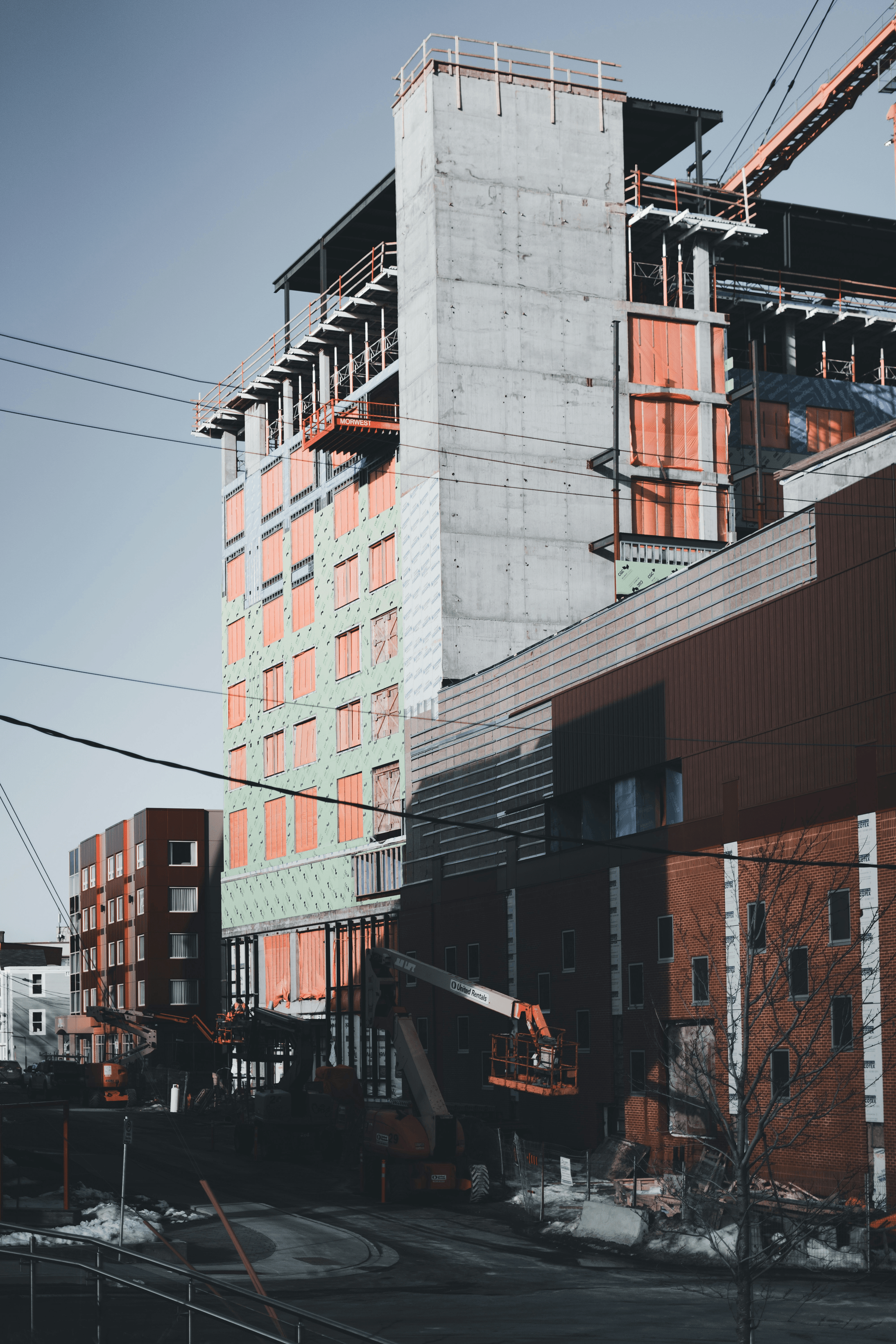 Efficient assembly of modular apartment buildings